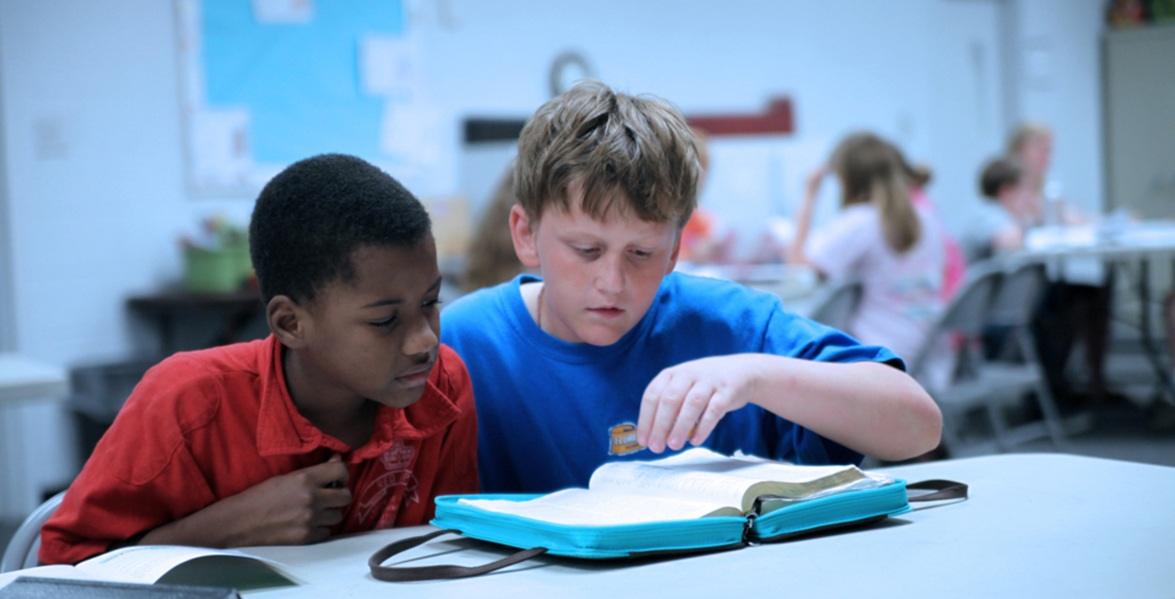 Children learning together during an RU program